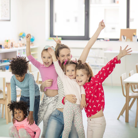 happy children with teacher